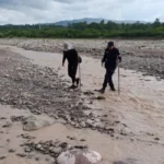 Descubren cadáver en río Perico durante búsqueda de desaparecido