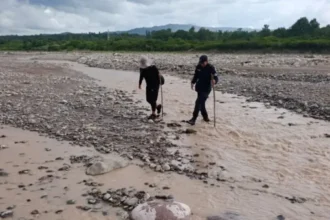 Descubren cadáver en río Perico durante búsqueda de desaparecido